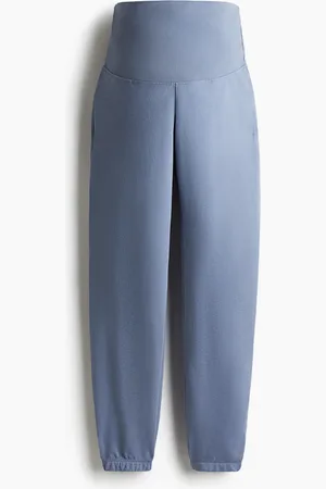 H&M MAMA Joggers som er smallere forneden