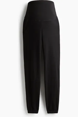 H&M MAMA Joggers som er smallere forneden