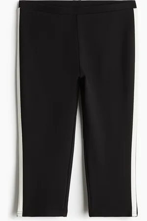 H&M Caprileggings med sidestribe