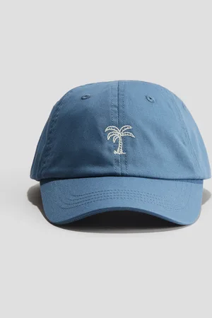 H&M Kasket i twill med motiv