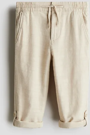 H&M Chinos i bomuld med ben, der kan smøges op