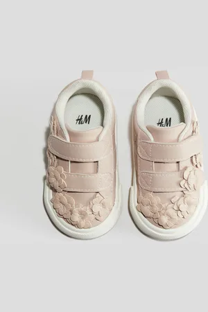 H&M Sneakers med blomsterapplikationer