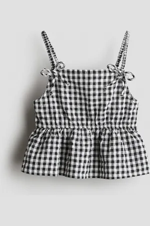 H&M Peplumtop med sløjfedetalje