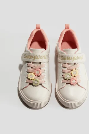 H&M Sneakers i canvas med applikationer