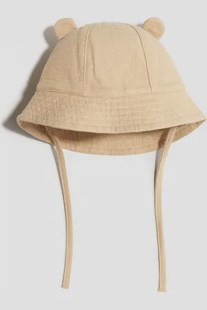 H&M Solkasket med øredetalje