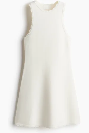 H&M Minikjole med tungekanter