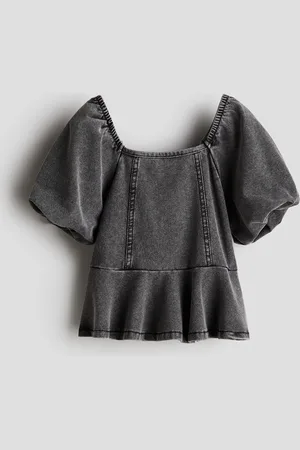 H&M Peplumbluse med denimlook