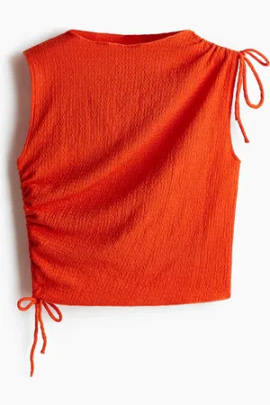 H&M Top med snøredetalje