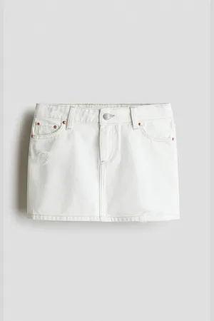 H&M Nederdel i denim med sliddetaljer