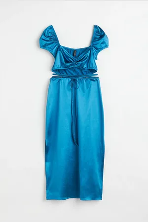 H&M Cut out-kjole med glans