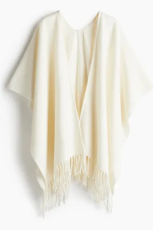 H&M Poncho med frynser