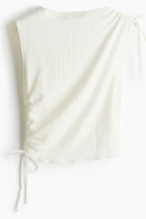 H&M Top med snøredetalje