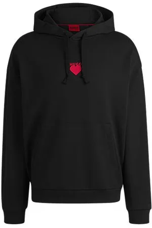 HUGO BOSS Hættetrøje i sweatkvalitet af bomuld med slogan og hjertegrafik