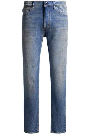 HUGO BOSS Jeans med tapered fit i blå denim med mud wash