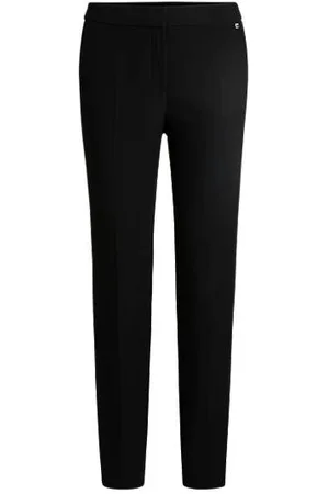 HUGO BOSS Bukser med slim fit i stof med stræk og med logovedhæng
