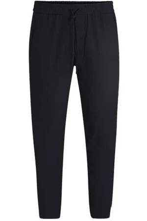 HUGO BOSS Tapered fit bukser i vandskyende stof med stræk