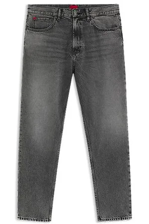 HUGO BOSS Tapered fit jeans i grå denim med slidte detaljer