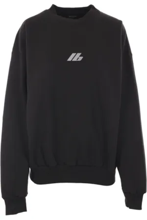 Balenciaga Sweathshirts & Hoodies, Dame, Sort, S, Bomuld, Sort Loose-Fit Sweater med Reflekterende Logo