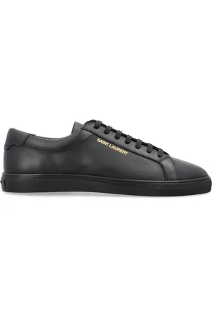 Saint Laurent Sko, Herre, Sort, 42 EU, Uld, Sorte Lædersneakers med Guldlogo