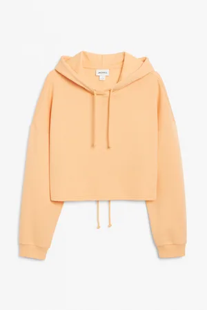 Monki Cropped hoodie with cut out back