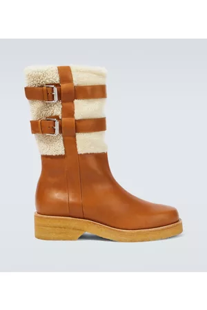 Christian Louboutin Shearling-trimmed leather boots
