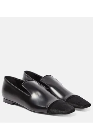 Totême Leather and calf hair loafers