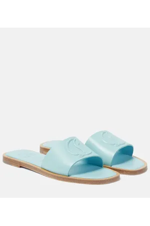 Christian Louboutin CL embossed leather mules