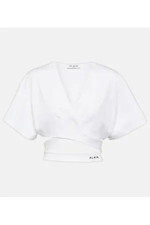 Alaïa AlaÃ¯a Logo cotton jersey crop top