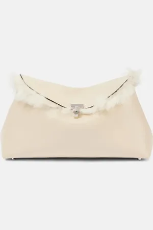 Totême T-Lock shearling-lined leather clutch