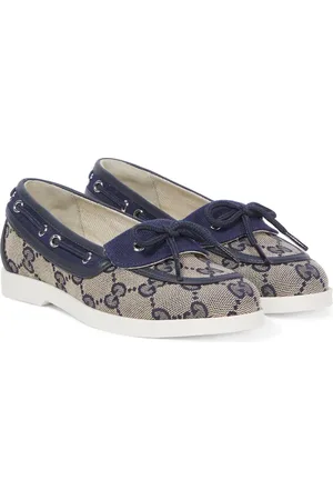 Gucci GG Canvas leather-trimmed boat shoes