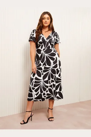 Friends Like These V-Neck Flutter Sleeve Midi Dress52
