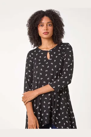 Roman Bow Print Cutout Tunic Top44
