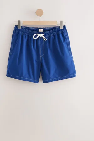 Next Badeshorts med kontrastsømLille kort