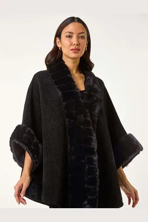 Roman Kunstpelsstrikket ponchoen
