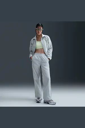 Nike Vævede Windrunner-bukser med høj talje og åben kant til kvinder