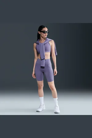 Nike Universa-cykelshorts (20 cm) med medium støtte, høj talje og lommer til kvinder