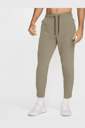 Nike Alsidige Unlimited-Dri-FIT-bukser med lynlåsmanchetter til mænd