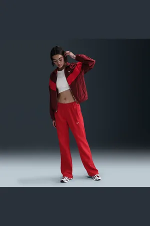 Nike Maskinstrikkede Sportswear Windrunner-bukser med mellemhøj talje og slank pasform til kvinder