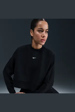 Nike Kort, oversized Prima Dri-FIT-top med rund hals til kvinder