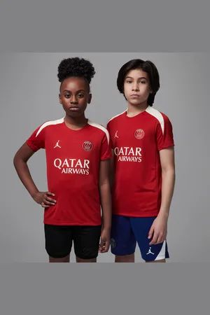 Jordan Maskinstrikket Paris Saint-Germain Strike Fourth Dri-FIT-fodboldoverdel med korte ærmer til større børn